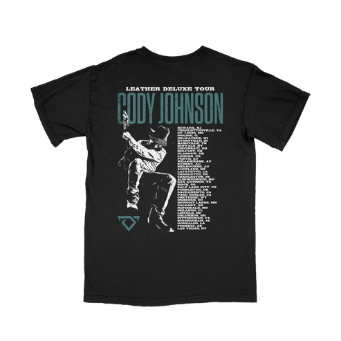 Black t-shirt with graphic design and text on the back, featuring a silhouette and event details.
