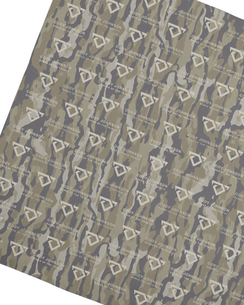 Patterned paper with text and geometric shapes on a gray background