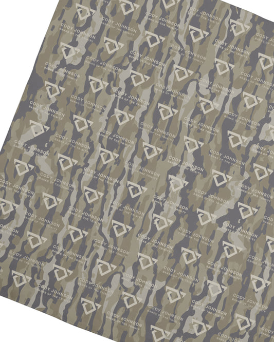 Patterned paper with text and geometric shapes on a gray background