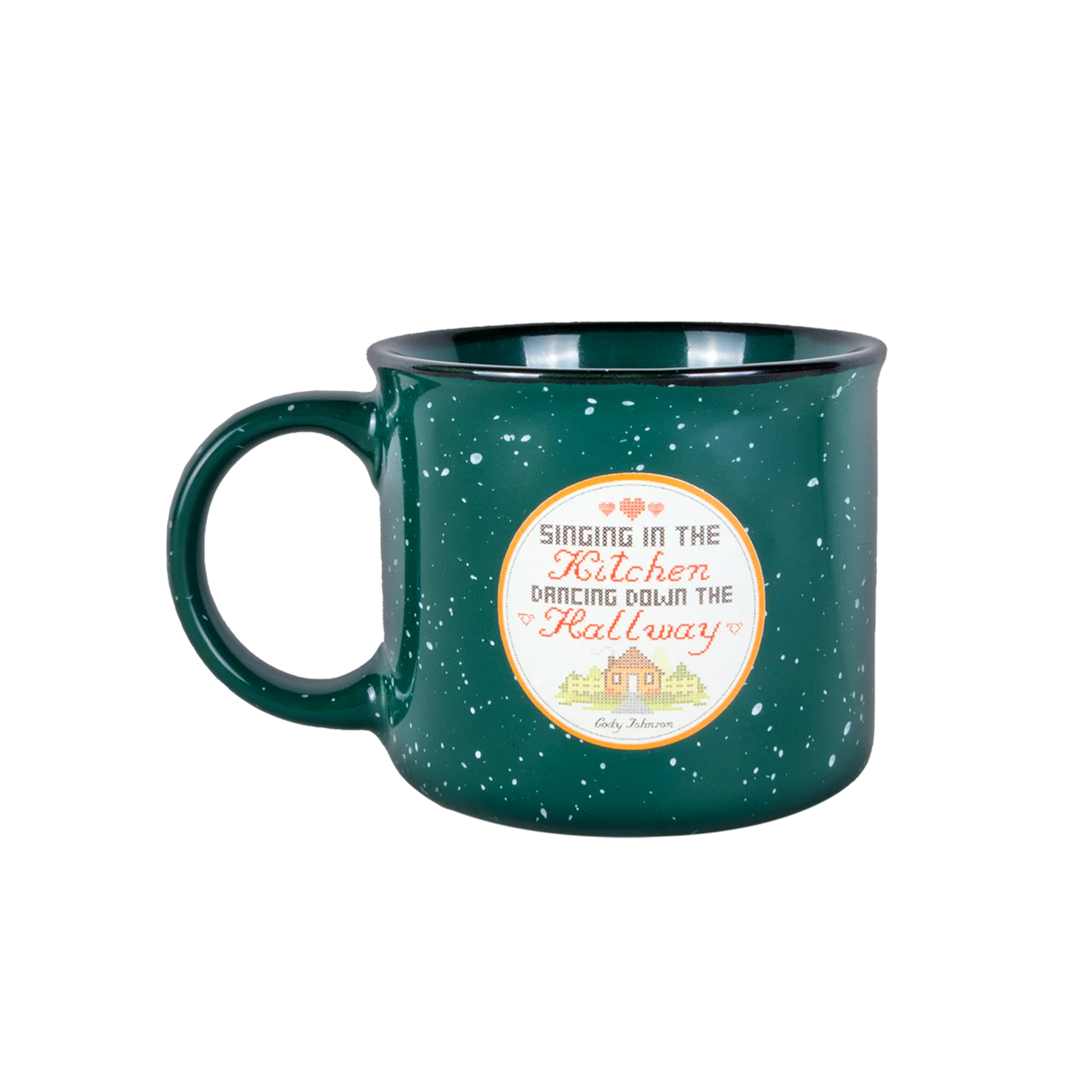 Green speckled mug with a decorative label on a white background singing in the kitchen dancing down the hallway Cody johnson COJO