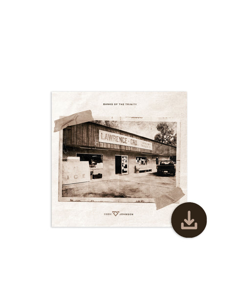 Black and white photo of a building with a sign, on a white background