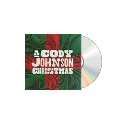 Vinyl record with a red and green cover featuring 'A Cody Johnson Christmas' text.