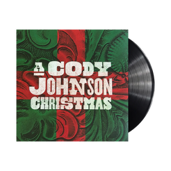 Vinyl record with a red and green cover featuring 'A Cody Johnson Christmas' text.