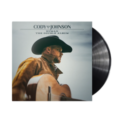 Vinyl record and cover featuring a man in a cowboy hat with 'Cody Johnson' on the cover.