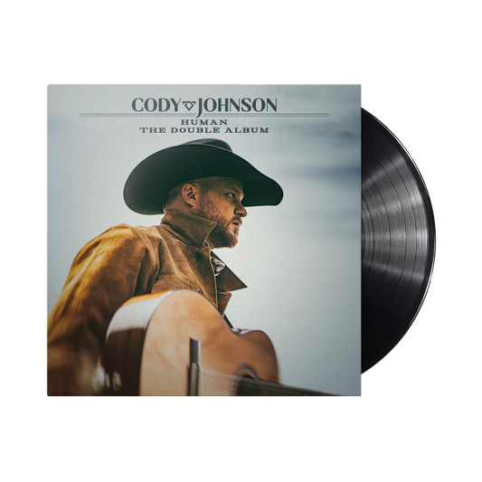 Vinyl record and cover featuring a man in a cowboy hat with 'Cody Johnson' on the cover.