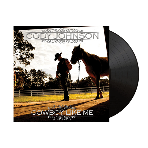 Vinyl record with cover featuring a silhouette of a man and horse, labeled 'Cody Johnson: Cowboy Like Me'. COJO