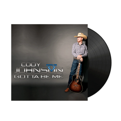 Vinyl record with a cover featuring a person holding a guitar, labeled 'Cody Johnson Gotta Be Me'.