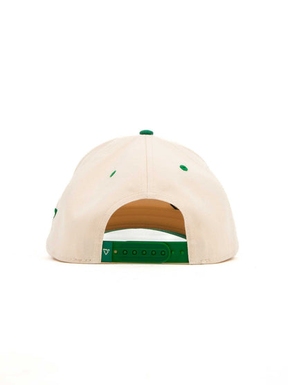 Beige cap with green accents on a white background