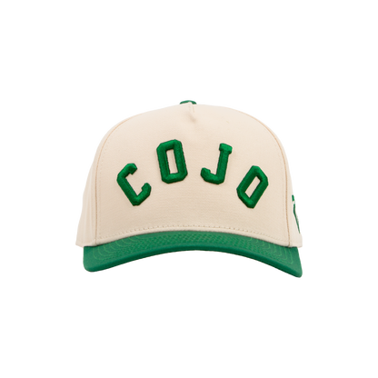 Beige and green cap with 'COJO' branding embroidered on the front