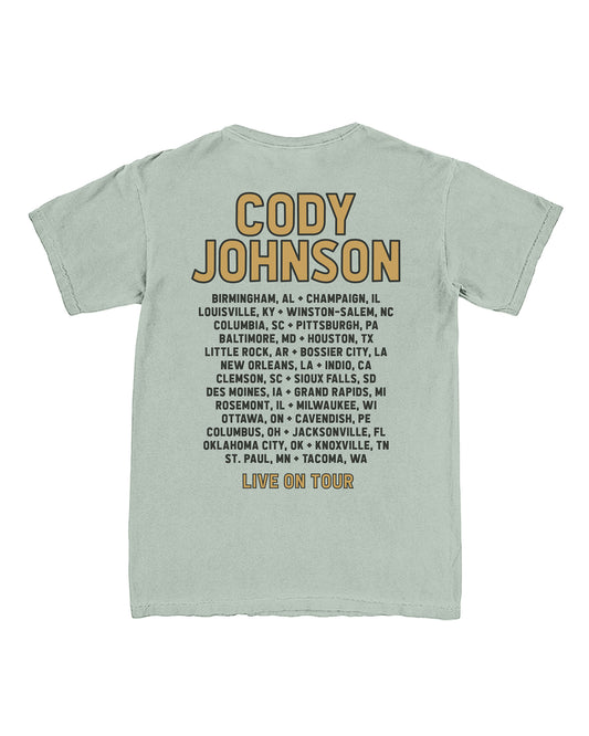 Light green t-shirt with 'Cody Johnson' and tour city list on a white background