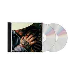 CD with a guitar-themed cover and two discs on a white background