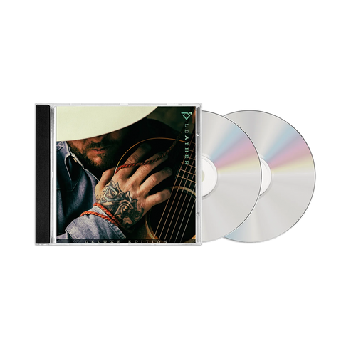 CD with a guitar-themed cover and two discs on a white background