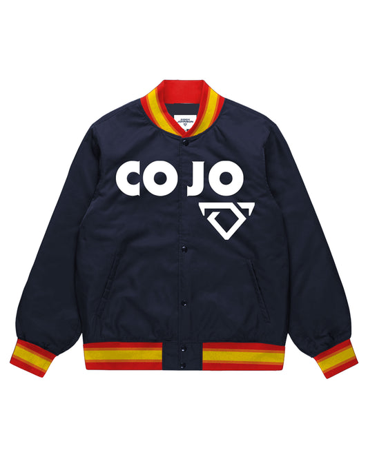 Navy blue jacket with red and yellow accents featuring 'CO JO' logo on a white background