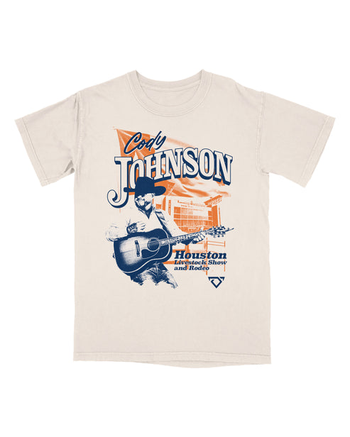 Beige t-shirt with graphic design of a person playing guitar and text on a white background