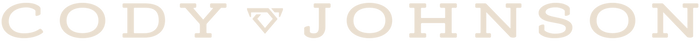 Text 'CODY JOHNSON' in a stylized font with decorative elements.